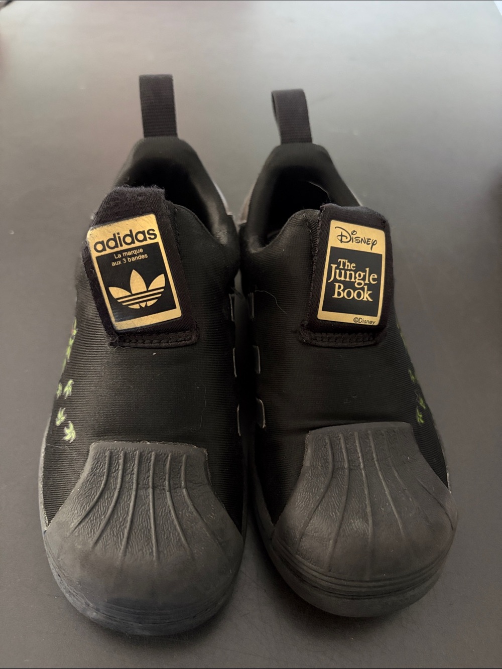 adidas Kids Black Slip-On Sneakers with Jungle Book Badge